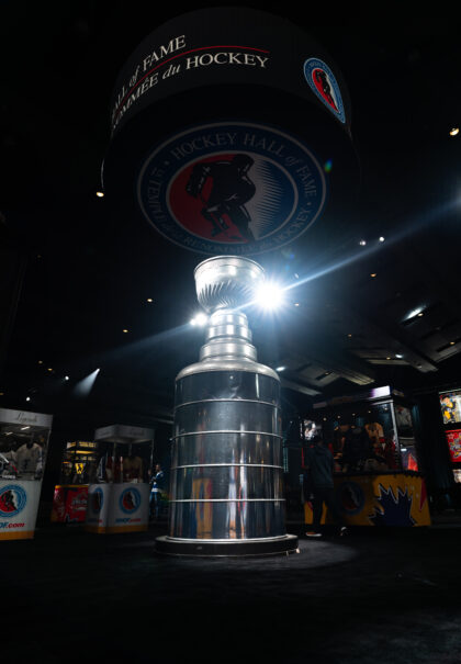 NHL All-Star Fan Fair Toronto 2024 Hockey Hall of Fame installation featuring illuminated Stanley Cup centerpiece and surrounding display exhibits